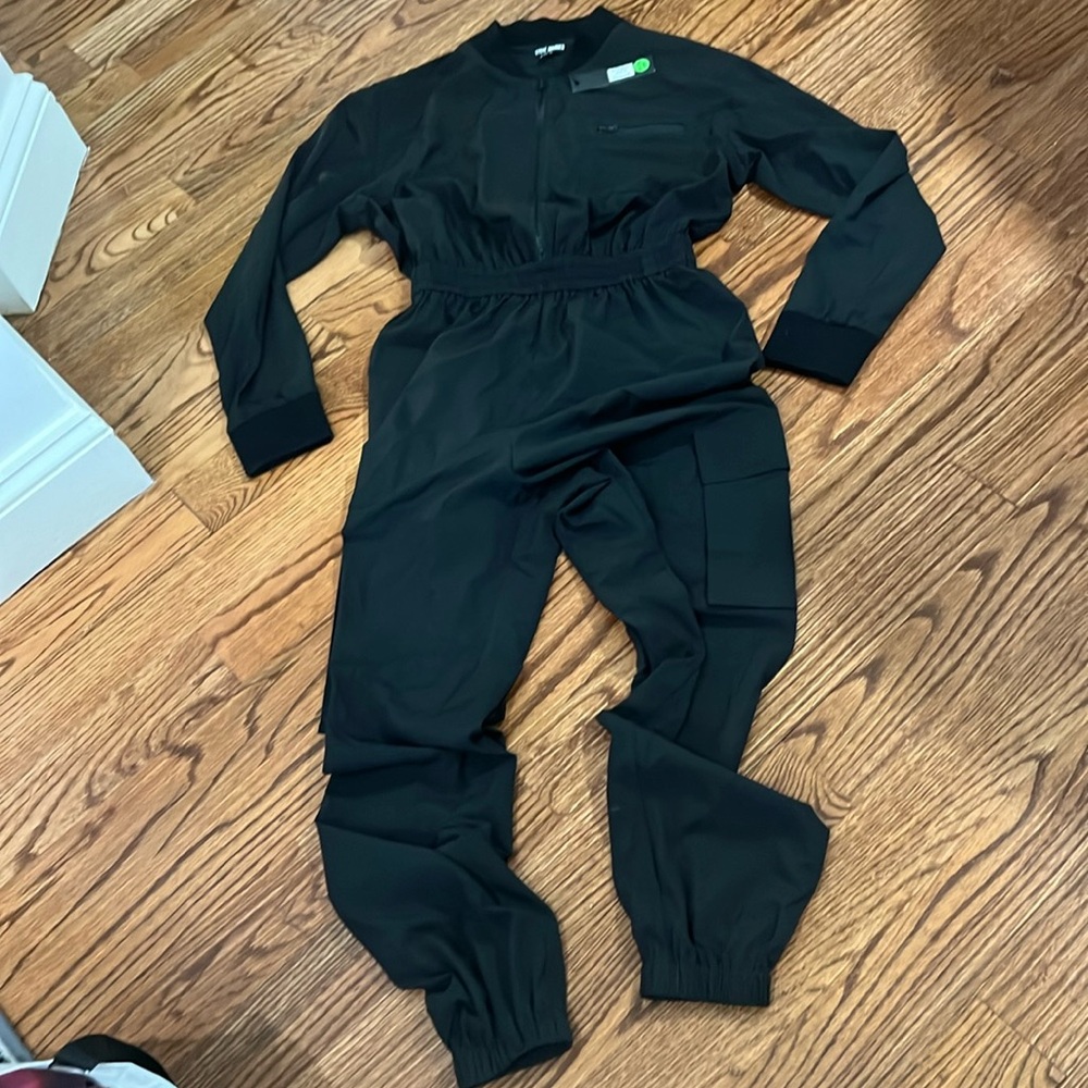 Steve Madden brand new black cargo jumpsuit with zipper and jogger bottom